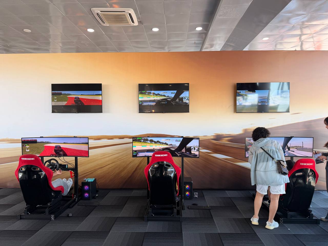 Trackside banners and digital billboards branded for Zeekr inside the virtual circuit