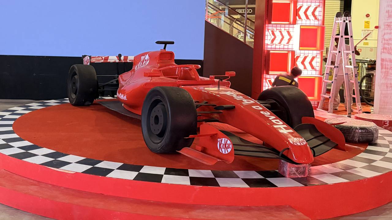 Full-scale F1 show car rental on display at a shopping mall event in Malaysia